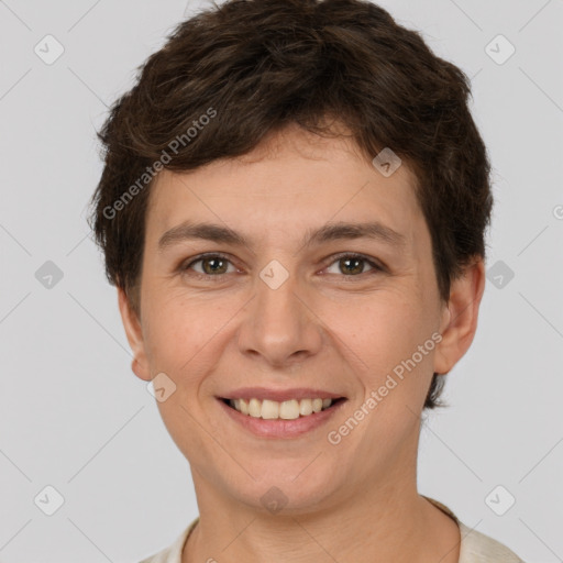 Joyful white young-adult female with short  brown hair and brown eyes