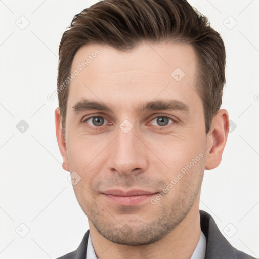 Neutral white young-adult male with short  brown hair and grey eyes