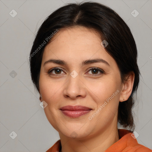 Joyful white adult female with medium  brown hair and brown eyes