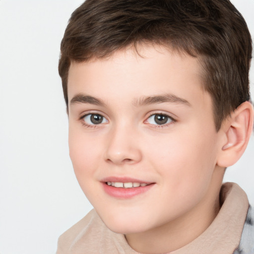 Joyful white child male with short  brown hair and brown eyes