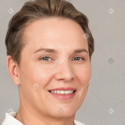 Joyful white young-adult female with short  brown hair and grey eyes