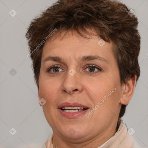 Joyful white adult female with short  brown hair and brown eyes