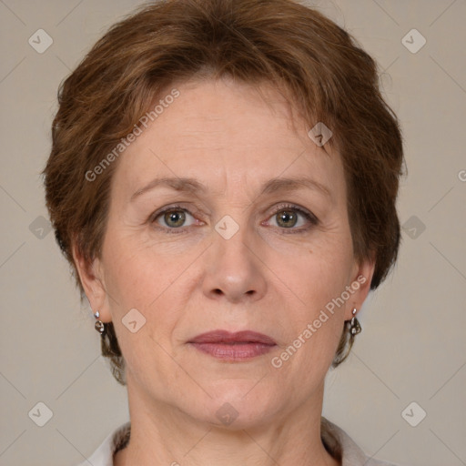 Joyful white adult female with short  brown hair and grey eyes