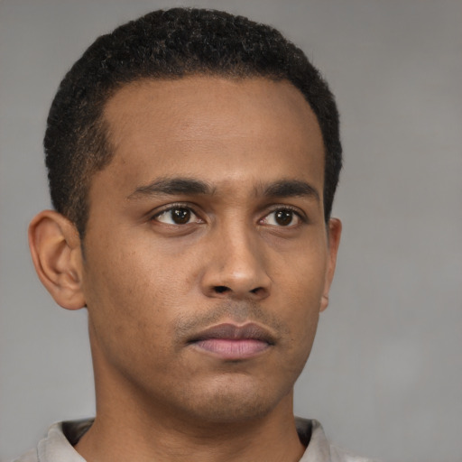 Neutral black young-adult male with short  brown hair and brown eyes