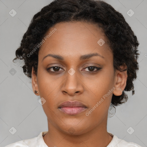 Neutral black young-adult female with short  brown hair and brown eyes