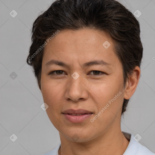 Joyful white adult female with short  brown hair and brown eyes