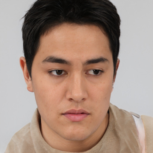 Neutral asian young-adult male with short  brown hair and brown eyes