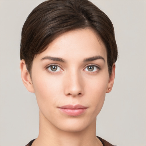 Neutral white young-adult female with short  brown hair and brown eyes