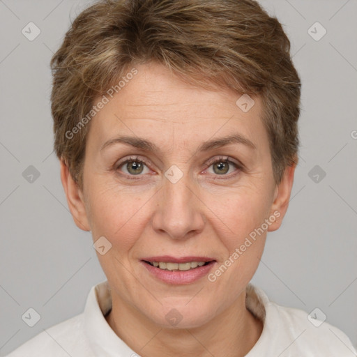 Joyful white adult female with short  brown hair and brown eyes