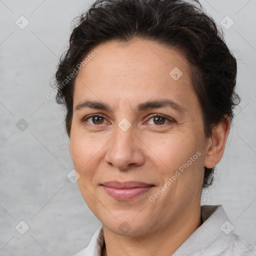 Joyful white adult female with short  brown hair and brown eyes