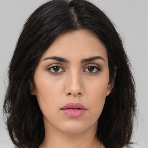 Neutral white young-adult female with long  black hair and brown eyes