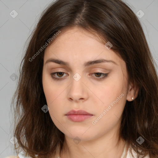 Neutral white young-adult female with medium  brown hair and brown eyes