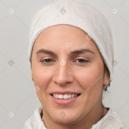 Joyful white adult female with short  brown hair and brown eyes