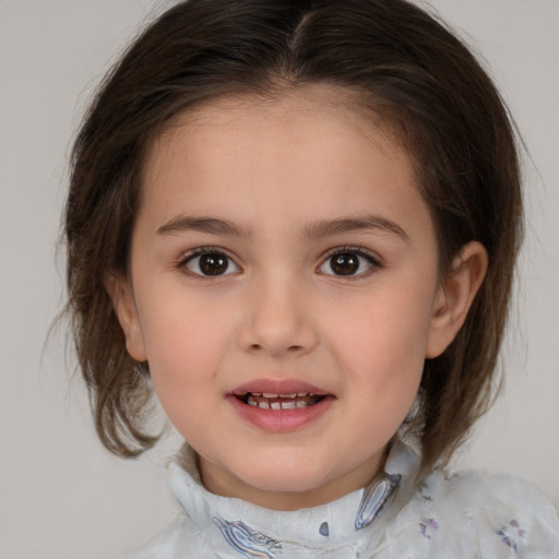 Joyful white child female with medium  brown hair and brown eyes