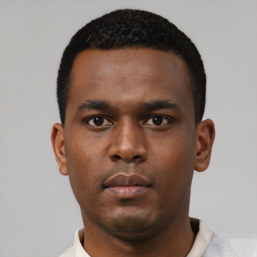 Neutral black young-adult male with short  black hair and brown eyes