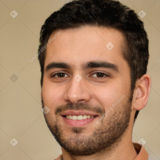 Joyful white young-adult male with short  brown hair and brown eyes