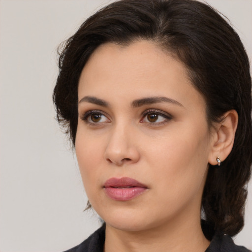 Neutral white young-adult female with medium  brown hair and brown eyes