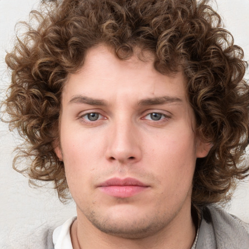 Neutral white young-adult male with medium  brown hair and brown eyes