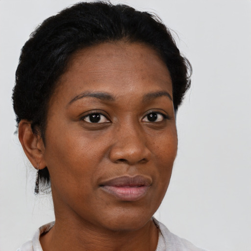 Neutral black young-adult female with short  brown hair and brown eyes