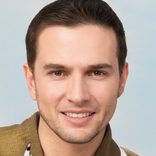 Joyful white young-adult male with short  brown hair and brown eyes