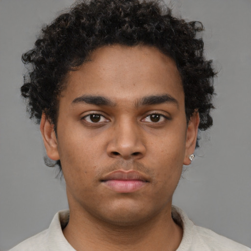 Neutral black young-adult male with short  brown hair and brown eyes