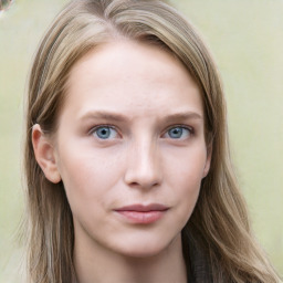 Neutral white young-adult female with long  brown hair and blue eyes