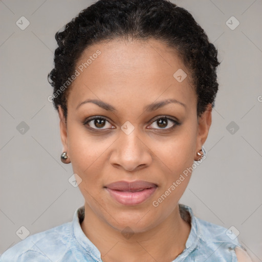 Joyful black young-adult female with short  brown hair and brown eyes