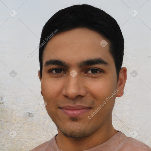 Joyful asian young-adult male with short  black hair and brown eyes