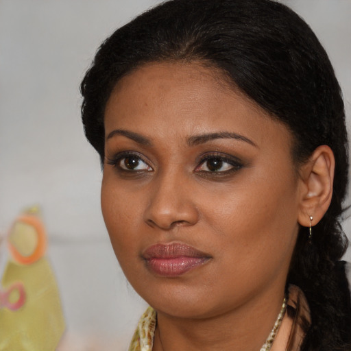 Neutral black young-adult female with long  brown hair and brown eyes