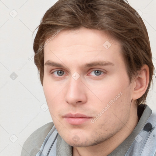 Neutral white young-adult male with short  brown hair and grey eyes