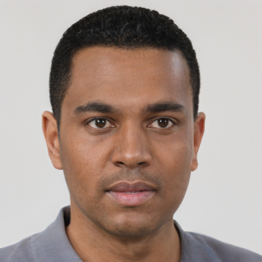 Neutral black young-adult male with short  black hair and brown eyes