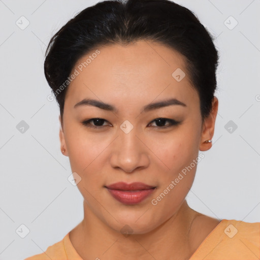 Joyful asian young-adult female with short  black hair and brown eyes