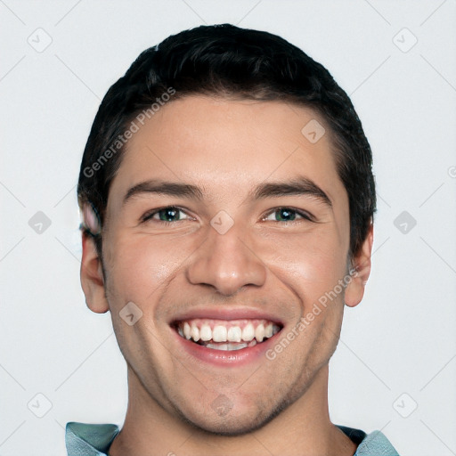 Joyful white young-adult male with short  black hair and brown eyes