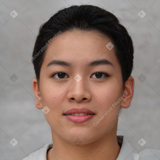 Joyful asian young-adult female with short  black hair and brown eyes