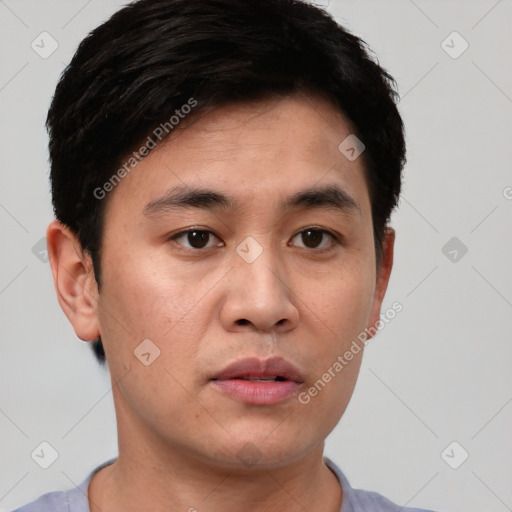 Neutral white young-adult male with short  black hair and brown eyes