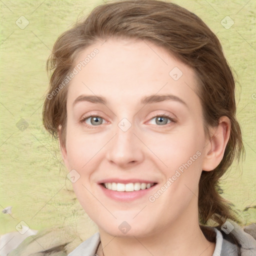 Joyful white young-adult female with medium  brown hair and green eyes