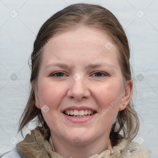 Joyful white young-adult female with medium  brown hair and blue eyes