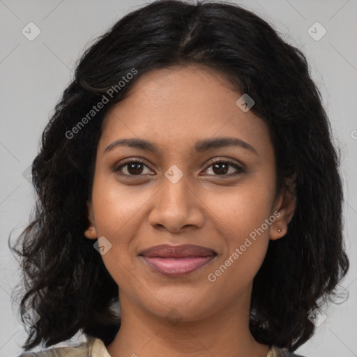 Joyful latino young-adult female with medium  brown hair and brown eyes