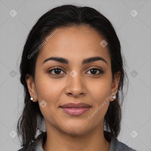 Joyful latino young-adult female with medium  brown hair and brown eyes