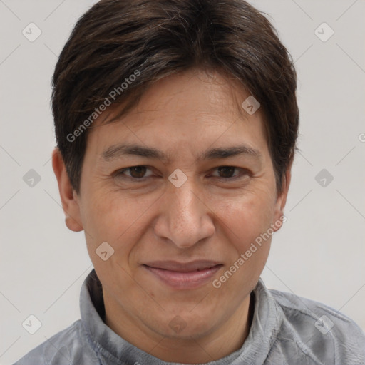 Joyful white adult male with short  brown hair and brown eyes