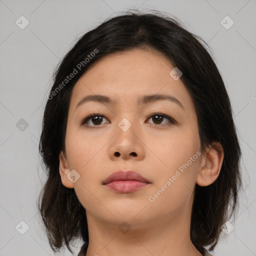 Neutral asian young-adult female with medium  brown hair and brown eyes