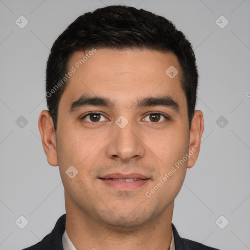 Joyful white young-adult male with short  black hair and brown eyes