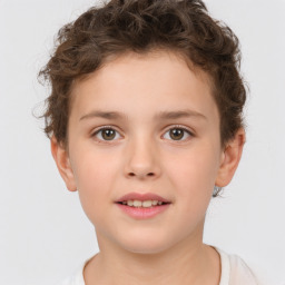 Joyful white child female with short  brown hair and brown eyes