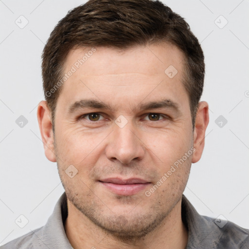 Joyful white adult male with short  brown hair and brown eyes