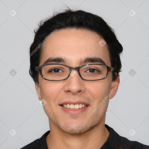 Joyful white young-adult male with short  black hair and brown eyes