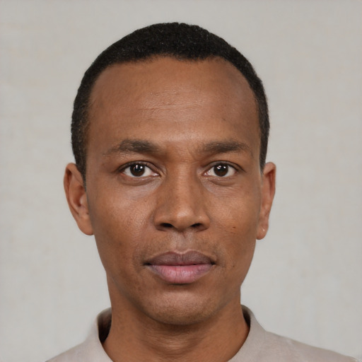 Neutral black young-adult male with short  black hair and brown eyes