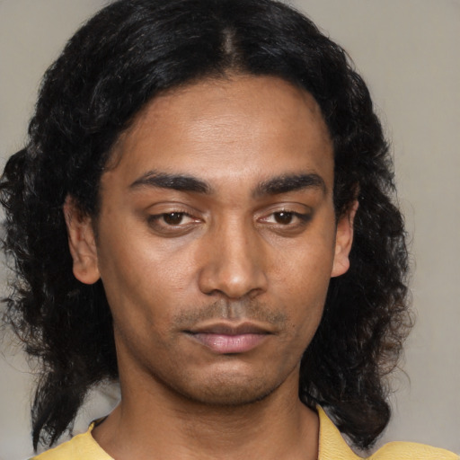 Neutral black young-adult male with medium  black hair and brown eyes