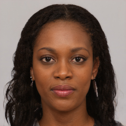 Neutral black young-adult female with long  black hair and brown eyes