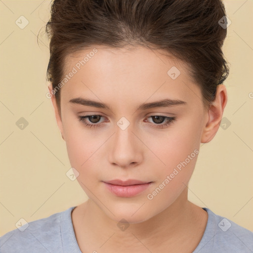 Joyful white child female with short  brown hair and brown eyes