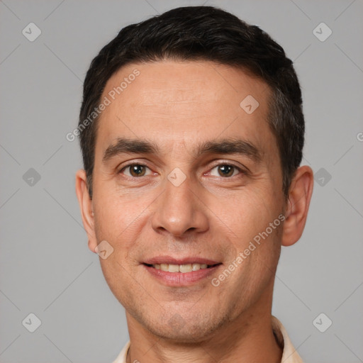 Joyful white adult male with short  brown hair and brown eyes